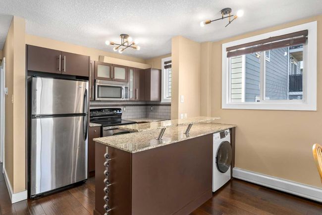 201 - 2209 14 St Sw, Condo with 1 bedrooms, 1 bathrooms and 1 parking in Calgary AB | Image 16