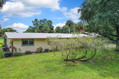 7481 Sw Citrus Boulevard, House other with 3 bedrooms, 3 bathrooms and null parking in Palm City FL | Image 3