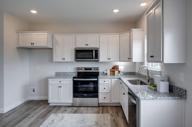 LUXE Kitchen featuring Upgraded Cabinetry + Full Granite Package | Image 12