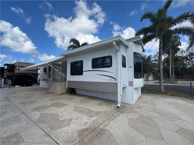 View of front of house featuring a carport | Image 34