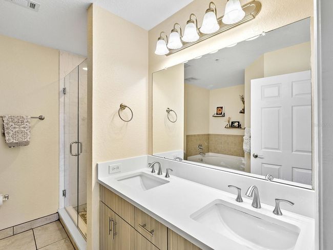 master bath with garden tub, shower separate and double vanity | Image 16