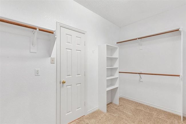 Spacious closet featuring carpet flooring | Image 19