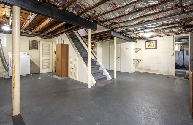 Heated, Unfinished area with washer and dryer | Image 11