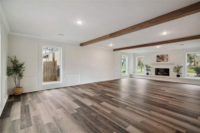 Another view of the generous sized family room. | Image 10