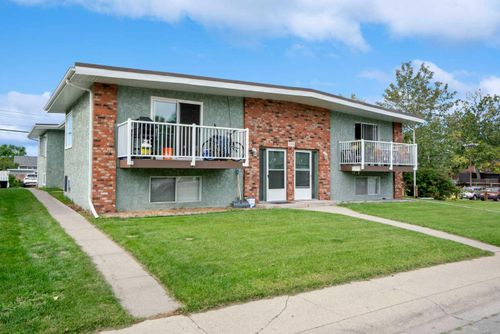 1123 Mckinnon Dr Ne, Calgary, AB, T2E6L4 | Card Image