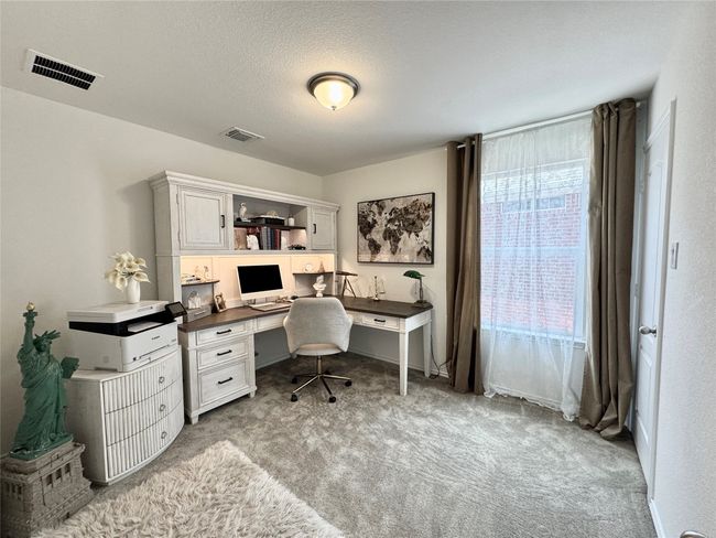 View of carpeted home office | Image 26
