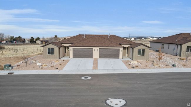 Ranch-style house featuring a garage | Image 33