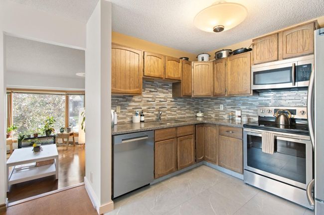 64 Cedarbrook Way Sw, Home with 4 bedrooms, 3 bathrooms and 2 parking in Calgary AB | Image 7
