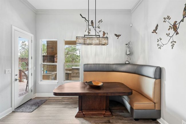 The kitchen table and booth are custom and come with the house, removeable upon request. | Image 20