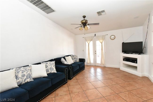 Large living room...all tile floor!! | Image 10