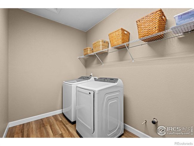 Main level laundry with storage | Image 12
