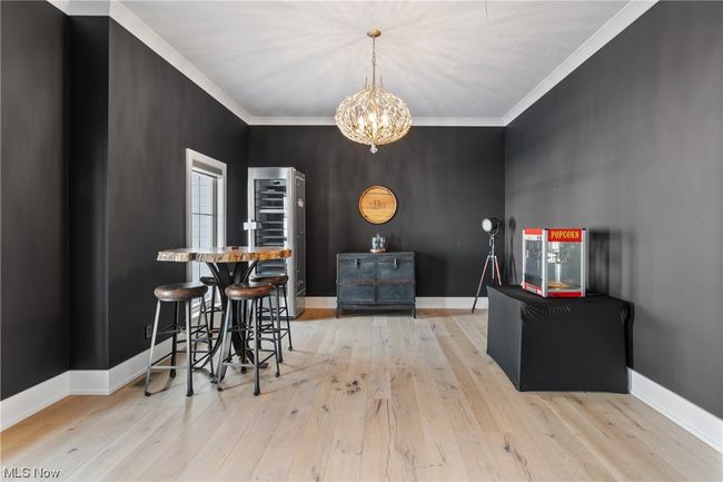 Office located off foyer with glass French doors | Image 4