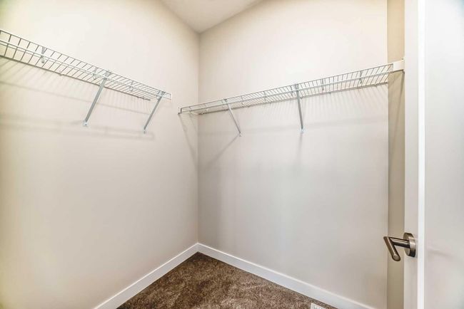 214 Shawnee Square Sw, Townhouse with 2 bedrooms, 3 bathrooms and 3 parking in Calgary AB | Image 30