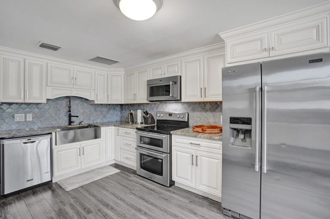502 Rambling Drive Cir, House other with 5 bedrooms, 3 bathrooms and null parking in Wellington FL | Image 19
