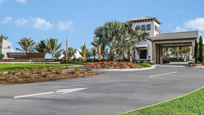 Welcome home at Esplanade Lake Club with the gated entrance. | Image 35