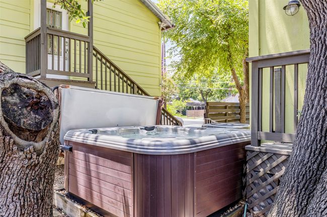 Wooden terrace featuring a hot tub | Image 32