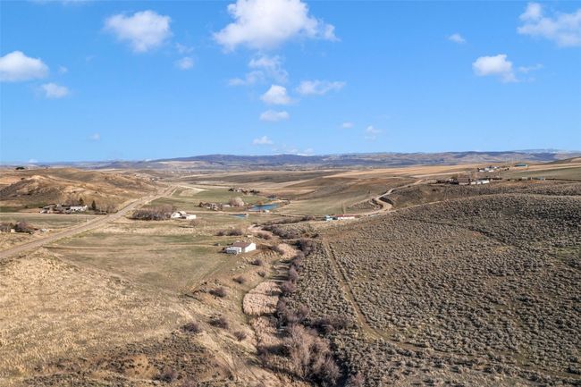 View of rural area featuring a mountainous background | Image 25