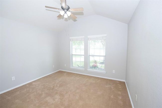 Additional at the front of the home with great space and vaulted ceiling. The perfect guest room. | Image 22