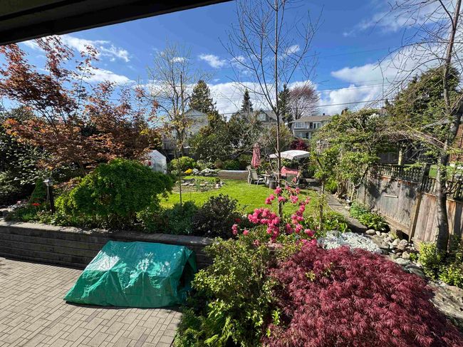 View of yard featuring fence and a patio area | Image 11