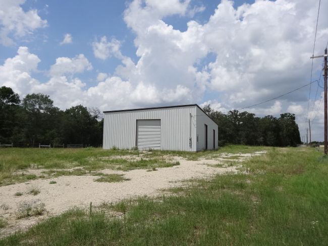 View of outbuilding with driveway | Image 16