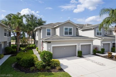 View of property with a garage | Image 2