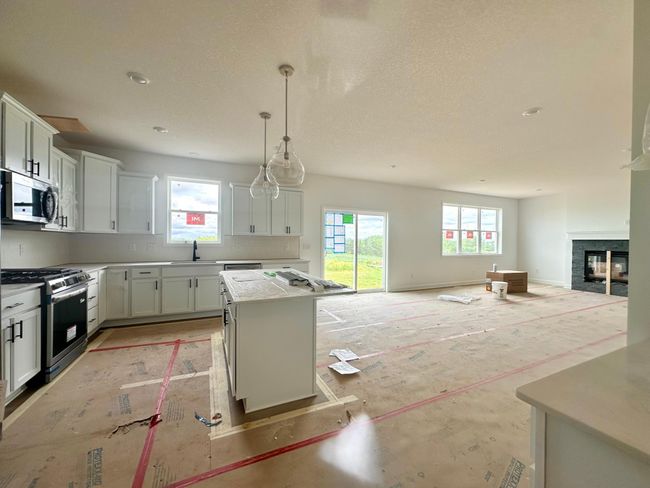 (Photo of a decorated model, actual homes finishes will vary) This main level study provides the perfect setting for those working from home, paying bills or completing a school project. | Image 12