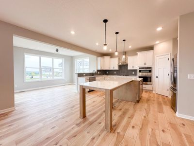 Gorgeous kitchen with an abundance of cabinet & counter space, gas cooktop and wall micro/oven combo! | Image 2