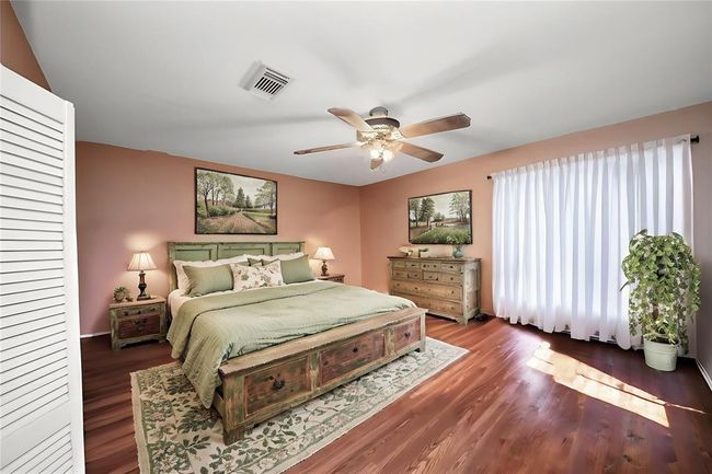 Enjoy this look at the nice size third bedroom. | Image 17