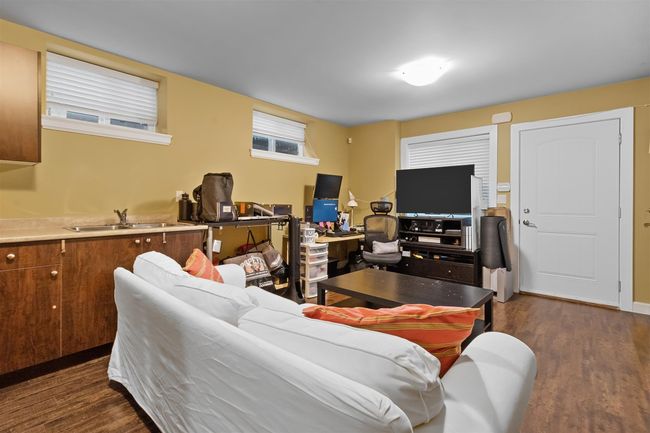 Living room featuring dark wood finished floors | Image 28