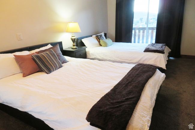 Bedroom featuring carpet floors | Image 8
