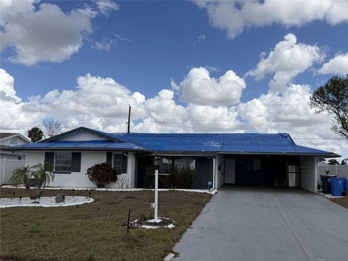 1205 Hacienda Dr, SUN CITY CENTER, FL, 33573-5525 | Card Image