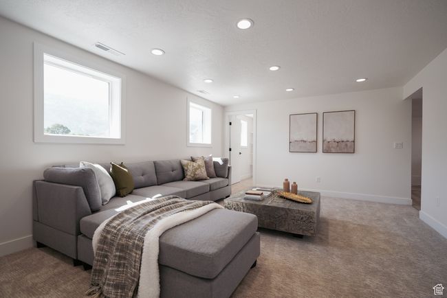 Living area with recessed lighting, carpet floors, and baseboards | Image 13