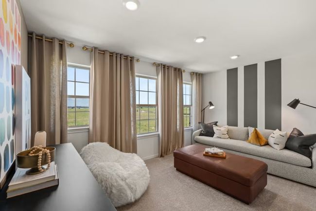 Photo of Pulte model home with same floor plan, not of actual home listed. | Image 6