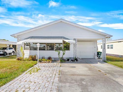 1040 Waterway Dr, Barefoot Bay, FL, 32976-7087 | Card Image
