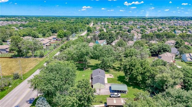 Aerial view of property's location with nearby suburban area | Image 55