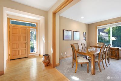 Gleaming Hardwood Floors in Inviting Entry | Image 2