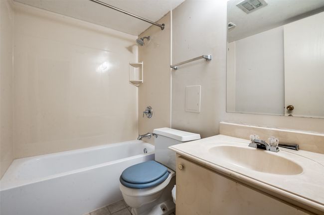 Bathroom with vanity, shower combination, and tile patterned flooring | Image 14