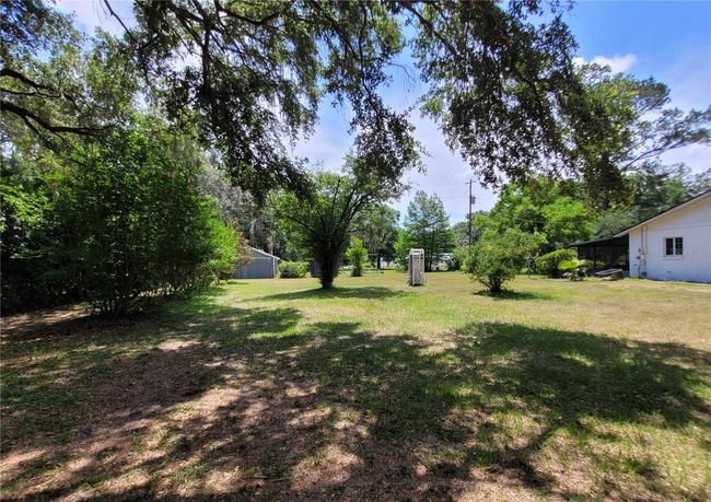 13385 Ne 10 Th Ct, House other with 3 bedrooms, 2 bathrooms and null parking in CITRA FL | Image 13