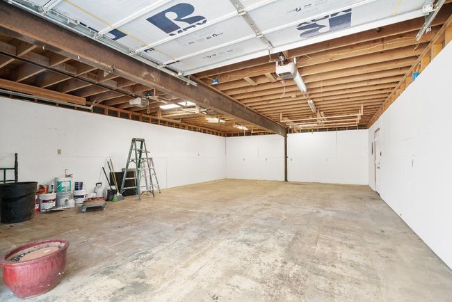 Garage featuring a garage door opener | Image 29