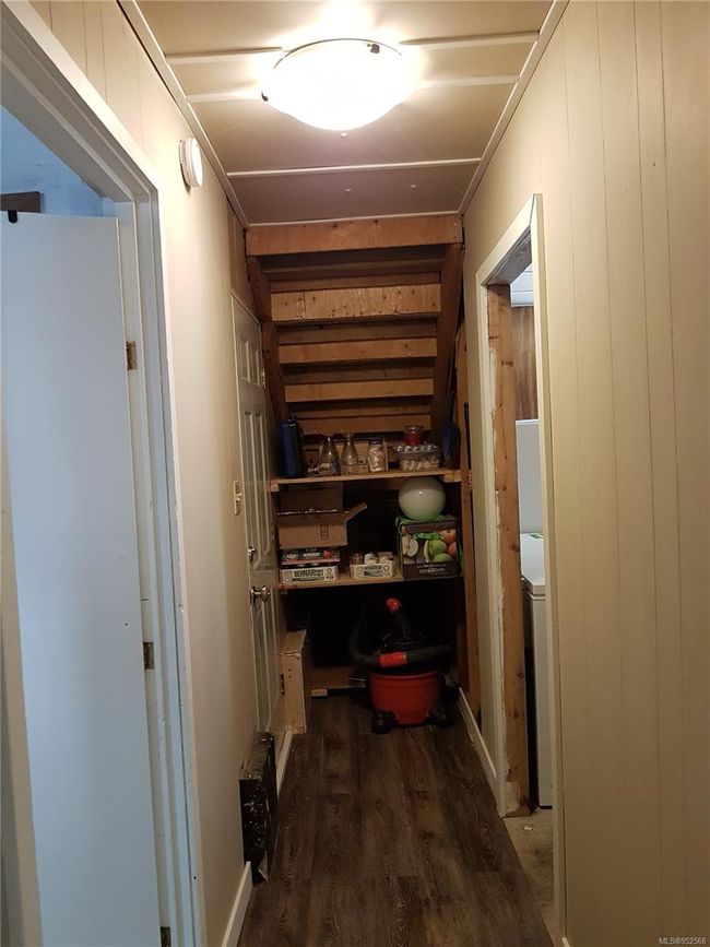 Ground floor hallway and under stair storage. | Image 35