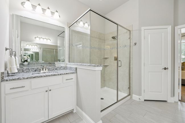 Bathroom with a stall shower and vanity | Image 14