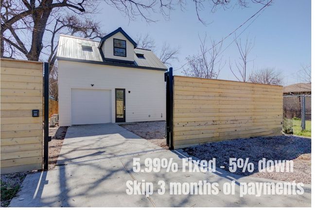 The back electric gate provides access from Santa Rosa street to the climate controlled one car garage (or flex space... more on that later!) and additional gravel off-street parking. | Image 7
