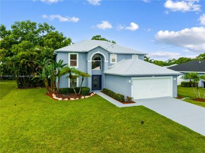 6450 Nw Hacienda Ln, House other with 5 bedrooms, 3 bathrooms and null parking in Port St. Lucie FL | Image 2