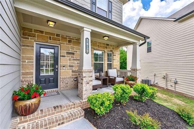 7059 Lancaster Xing, House other with 4 bedrooms, 3 bathrooms and 3 parking in Flowery Branch GA | Image 5
