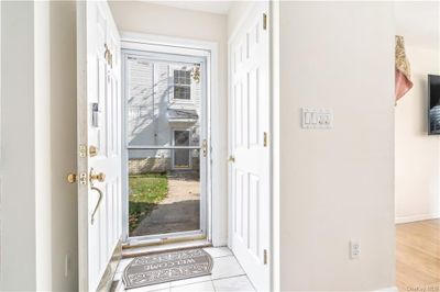 Entrance foyer with light hardwood / wood-style floors | Image 3