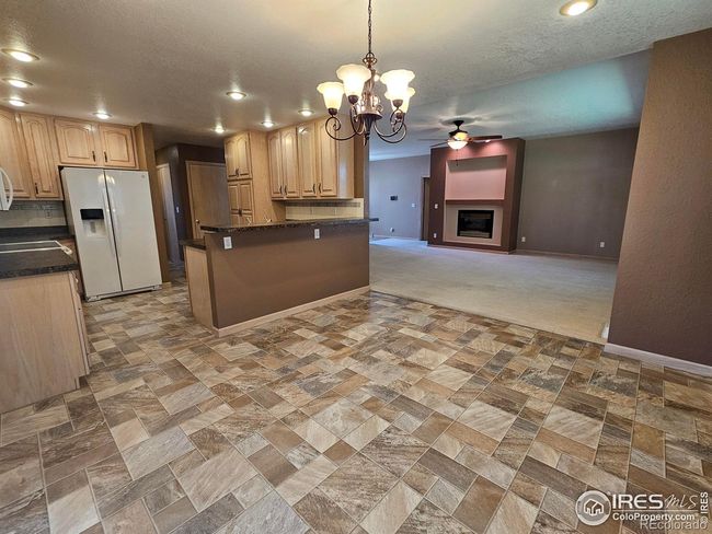 Dining area with breakfast bar | Image 7