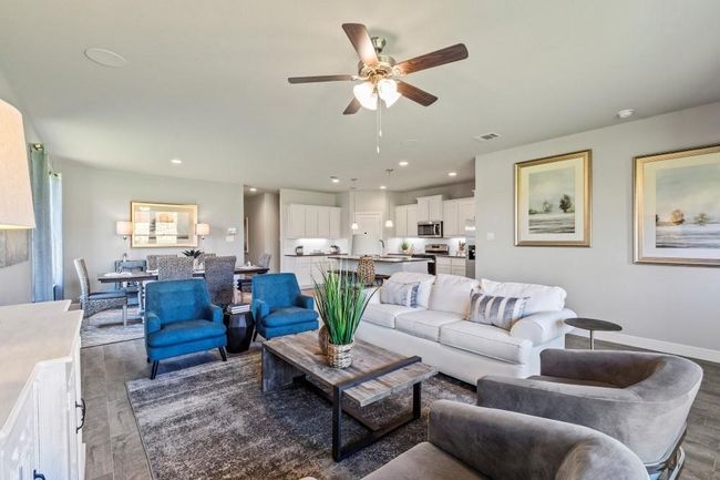 Living room featuring wood finished floors, a ceiling fan, and recessed lighting | Image 13