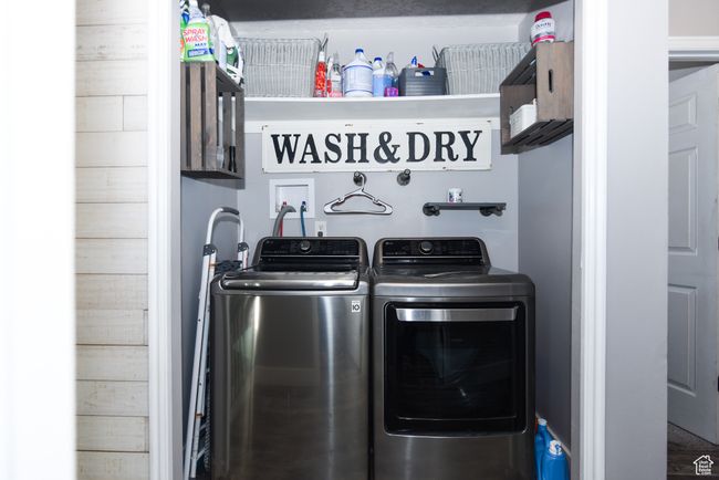 Clothes washing area with laundry area and washing machine and dryer | Image 27