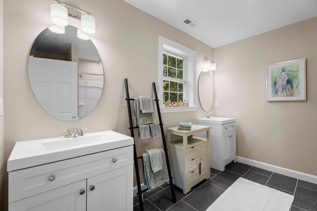 Master bedroom bath with two sink vanities | Image 9