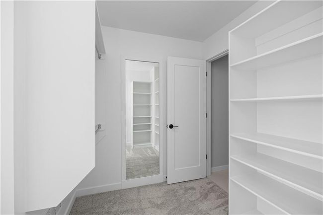 Primary Closet on 2nd Level - Photo is from a finished model | Image 24